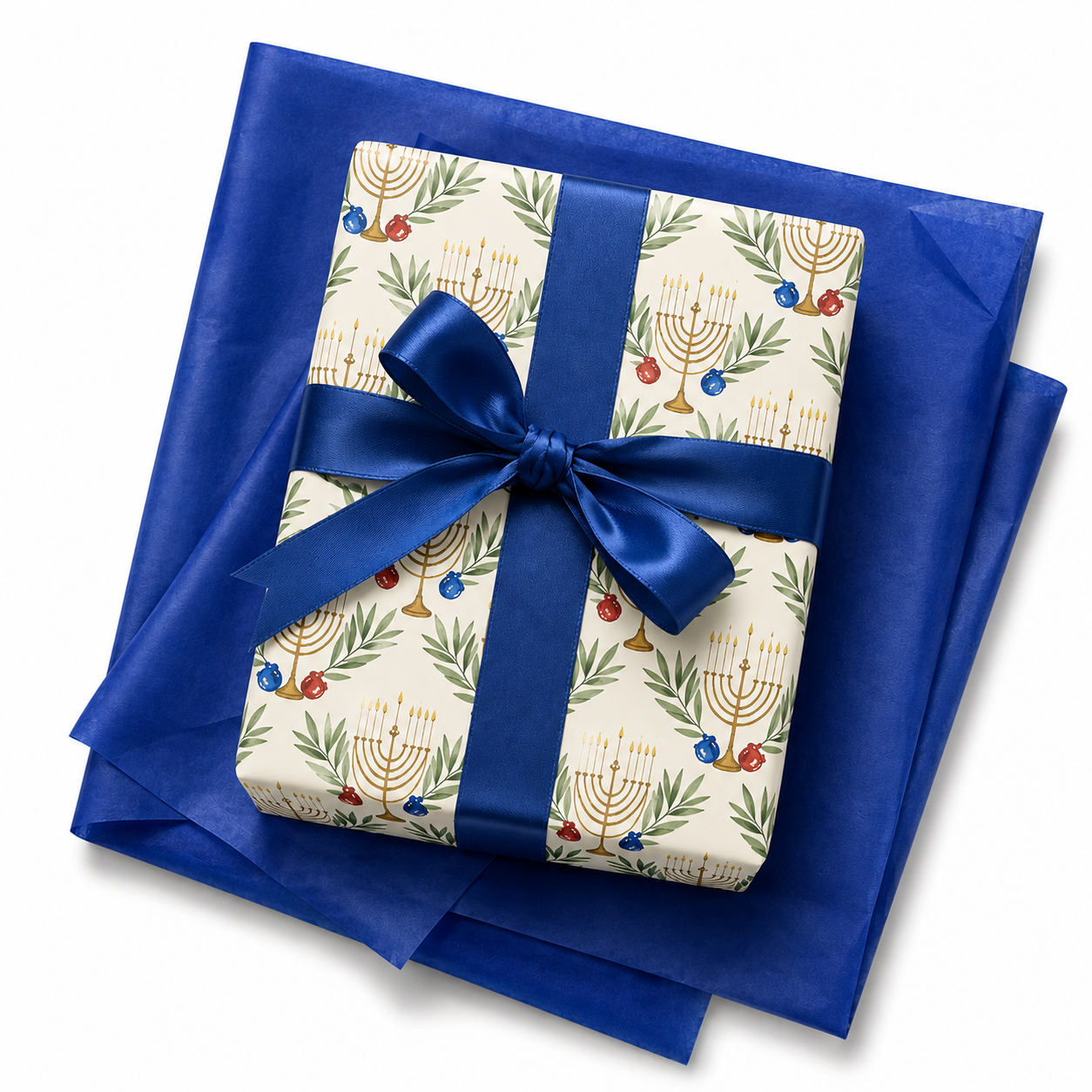 Menorah and olive branch Hanukkah wrapping paper in cream and gold with royal blue satin bow and matching blue tissue