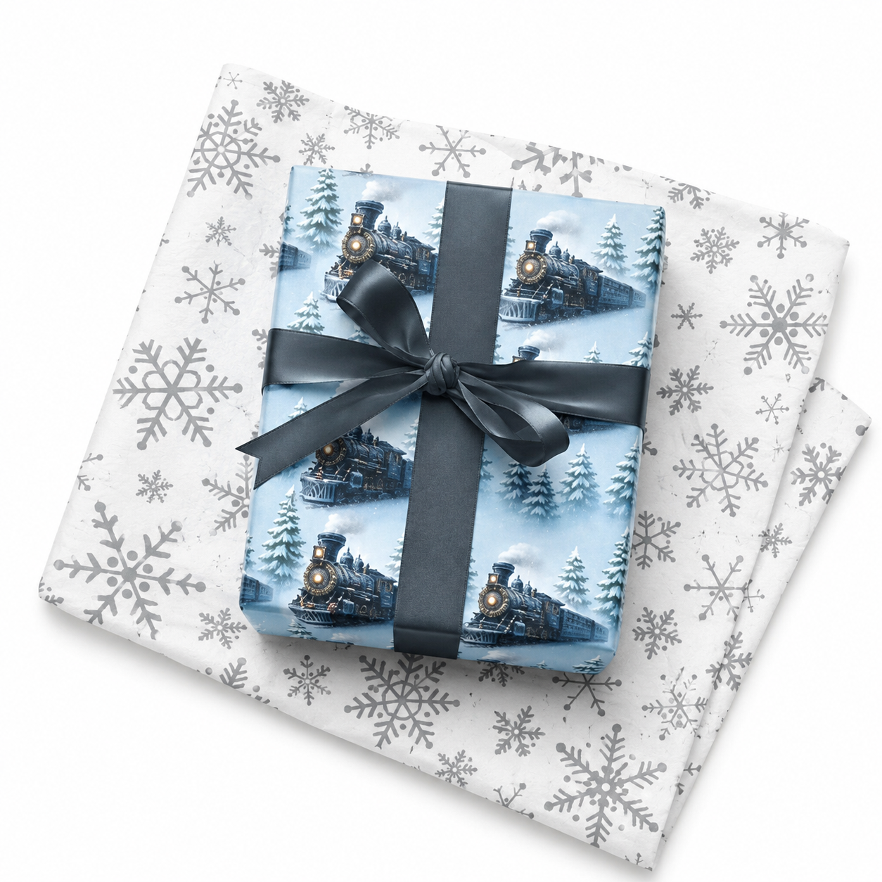 Vintage steam train winter wrapping paper with charcoal satin bow over silver snowflake tissue